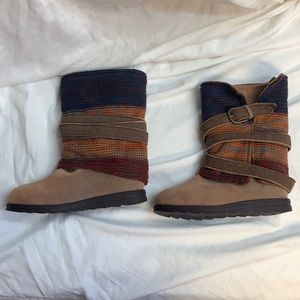 MukLuks winter boots. Lace on the inside and belt.